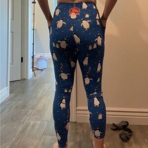 Feed  Me, Fight Me full length Cheistmas leggings.